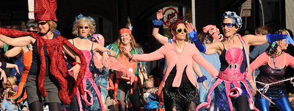 Procession of the Species parade Olympia women dancers