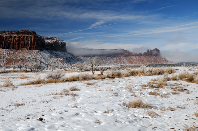 Buttes In Clouds On BLM Land Approaching Canyonlands National Park In Utah