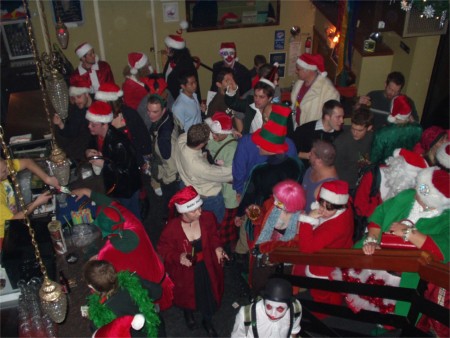 Seattle Santarchy Santas Overflowing Into A Bar