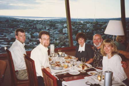 Family Celebrating Mom's Birthday Above Seattle In The Seattle Space Needle's SkyCity Restaurant Revolving