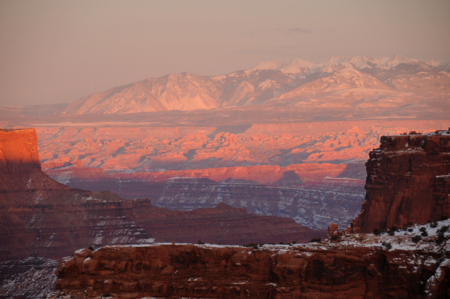 Shafer Trail Overlook To La Sal Mountains At Sunset In Canyonlands National Park