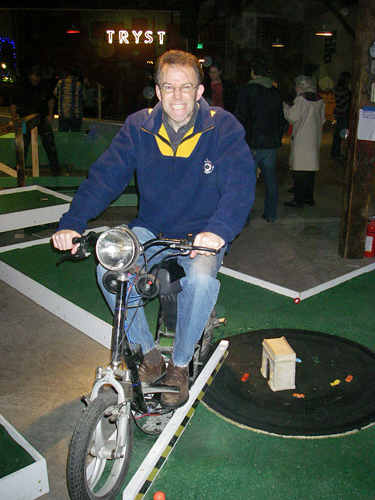 Seattle Smash Putt Miniature Golf Course Capitol Hill Electric Moped That Turns Rotating Platform