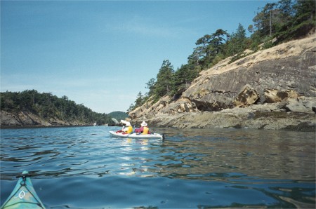 Mom And Karen Kayaking Into Sucia Island's Snoring Bay By Johnson Point