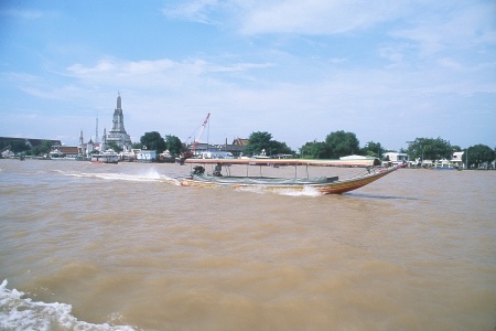 Bangkok Thailand Chao Phraya River With Water Taxi And Wat Arun