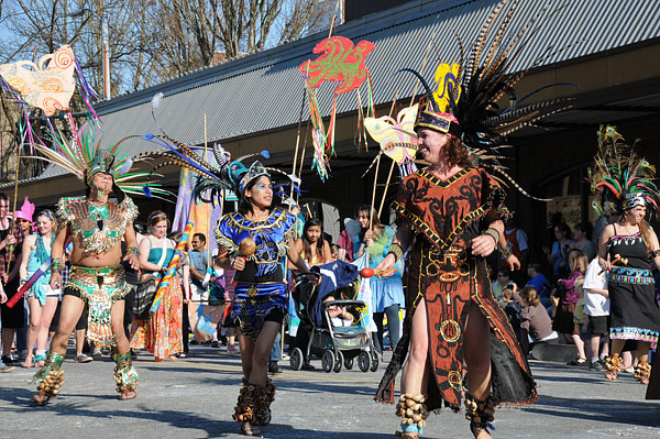 Procession of the Species parade Olympia dancers