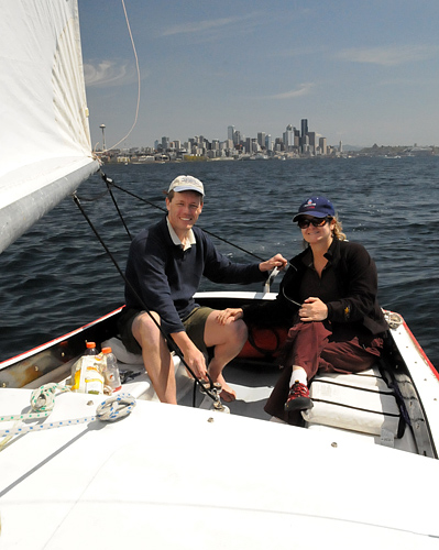 Sailing Elliott Bay in front of Seattle city skyline between Alki Beach and Puget Sound