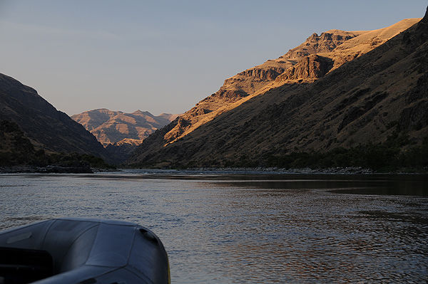 Hells Canyon Snake River raft bow shore sunset reflection