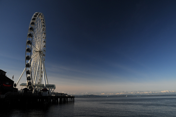 Seattle ferris wheel Great Wheel on pier over Elliott Bay Puget Sound
