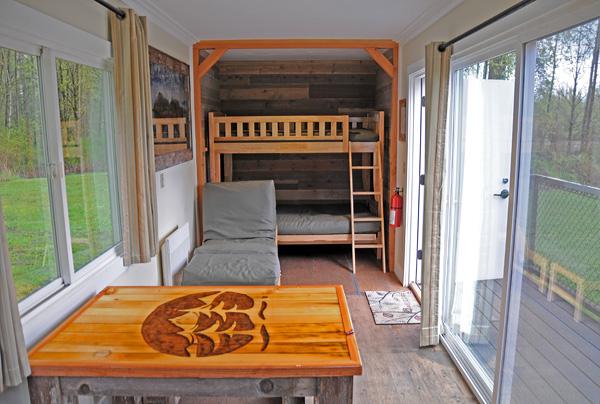 Tolt MacDonald Park shipping container camping cabin by Snoqualmie River interior sleeping area bunk beds