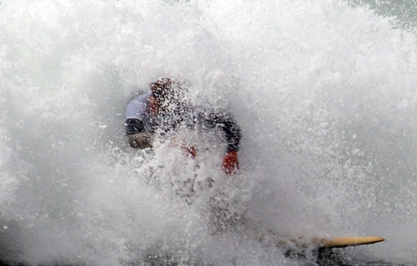 Salt Creek Beach Park surfer breaking through crashing wave