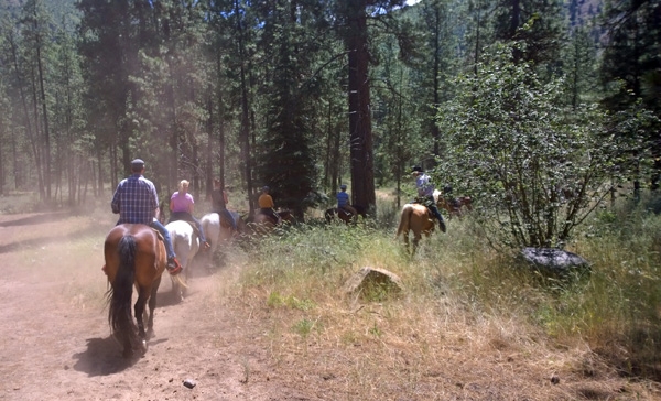 Leavenworth horseback riding group on trails