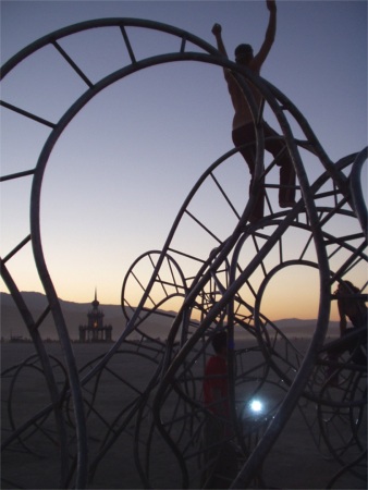 Moebius Strip Jungle Gym With Temple Of Honor In The Distance At Burning Man