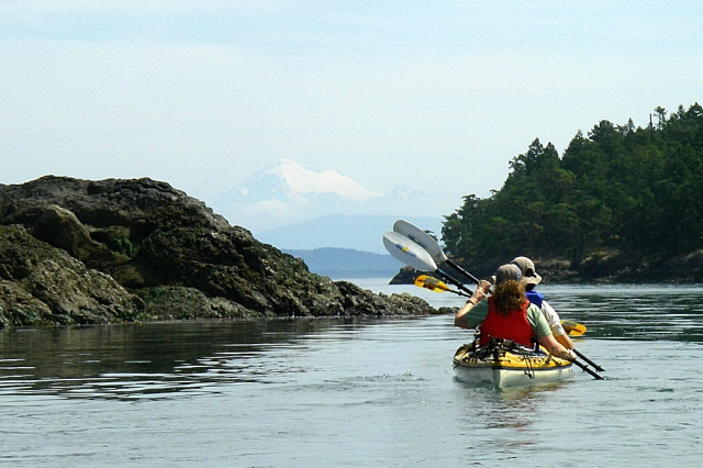 Sea Kayaking By Decatur Island With Mt Baker In Background, San Juan Islands