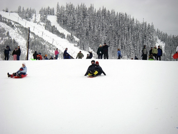 Hyak Sled Hill At Snoqualmie Pass Snow Park, Scott And Karen Sledding From The Top (Photo By Josh)