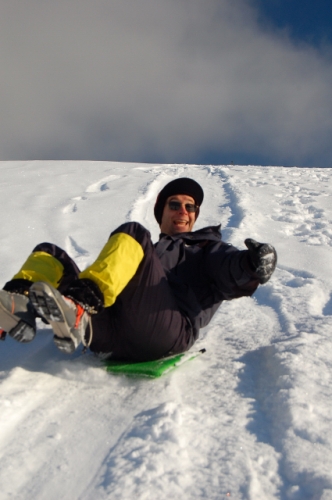 Scott Butt Sledding Down Keechelus Lake Dam