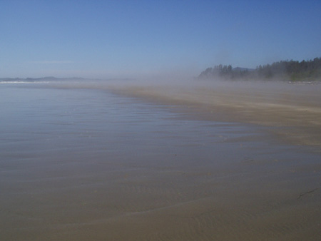 Fog Rising Up On The Incoming Water That Heats Up Over The Flats Of Long Beach, Pacific Rim National Park, Vancouver Island, British Columbia, Canada