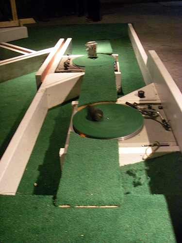 Seattle Smash Putt Miniature Golf Course Capitol Hill Turntables With Beer Can And Microphone Above Moats