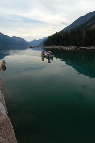 Dad And Mom Canoeing Up Into The Stehekin River From Lake Chelan