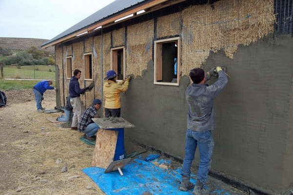 Ellensburg Straw Bale Construction Plastering Workshop Barn Raising, Group Plastering North wall