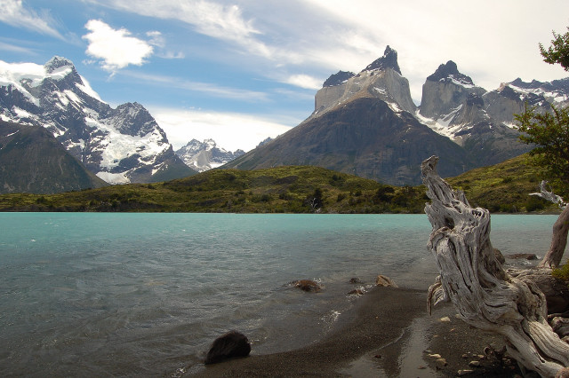 On The Shores Of Lago Nordenskljold / Lake, Looking Across To Cerro Paine Grande, Valle Del Frances (French Valley), And Los Cuernos (The Horns) In Parque Nacional Torres Del Paine / National Park, Chile