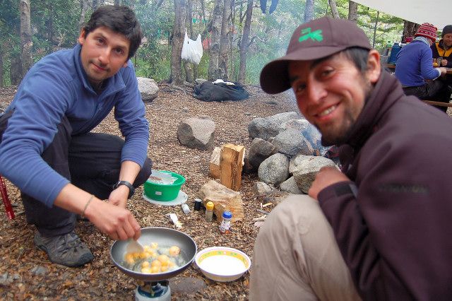 Kayak River Guides Cooking Up "Indian Bread" Fungus From Local Trees At Our Campsite Near The Glaciar Serrano / Glacier In Parque Nacional Bernardo O'Higgins / National Park, Chile