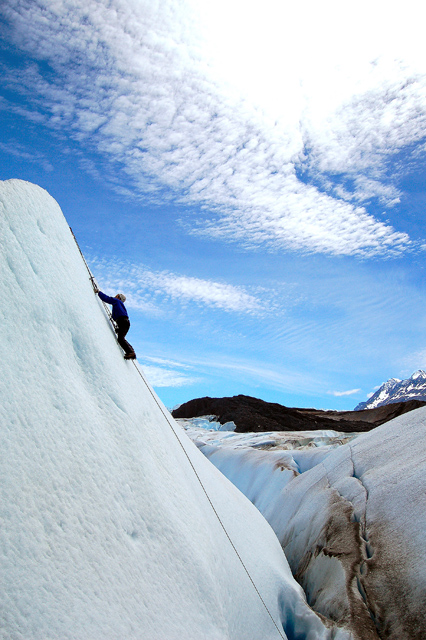 Scott Climbing Ice Wall On Glaciar Grey / Grey Glacier In Parque Nacional Torres Del Paine / National Park Chile