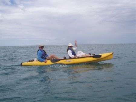 Dad And Mom Kayaking Out Beyond The Breakers Off Of St. Croix, Virgin Islands