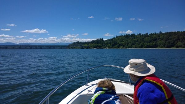 View from bow of skiff rental boat approaching Hood Canal Bridge