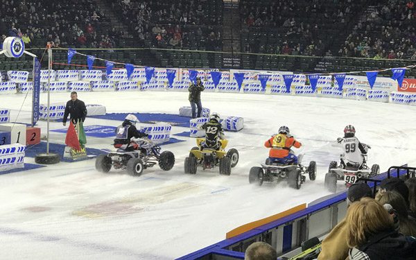 Ice Racing Championship Series 4 wheel ATVs launching from starting line at Everett Xfinity Arena