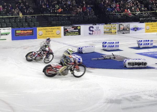 Ice Racing Championship Series motorycles sliding in corner at Everett Xfinity Arena