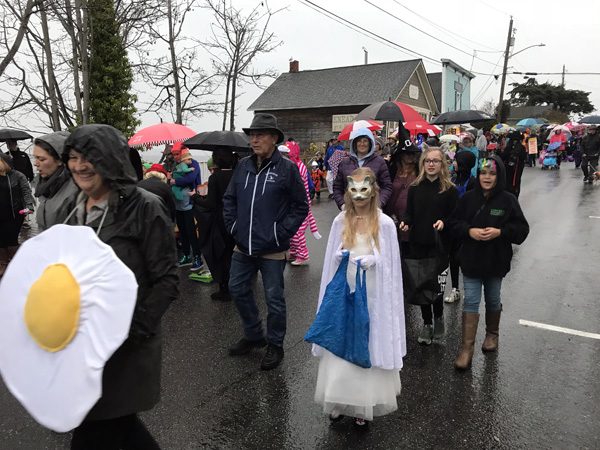 Coupeville Torchlight Parade costumes along Front Street