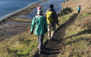 Hiking Ebey's Bluff Trail by Perego's Lagoon in Coupeville above Puget Sound beach
